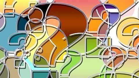 Grapphic depicting overlapping question mark symbols in a variety of sizes & colors.